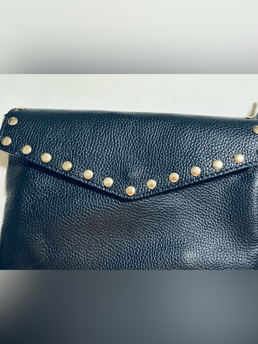 Black Pebbled Leather Envelope Clutch with Gold Stud Trim, shoulder strap